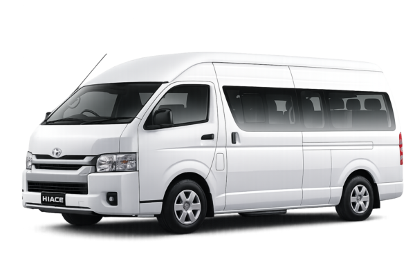 Toyota Hiace Commuter Luxury putih tampak serong depan dan samping untuk layanan sewa Hiace Luxury Bandung dengan driver profesional